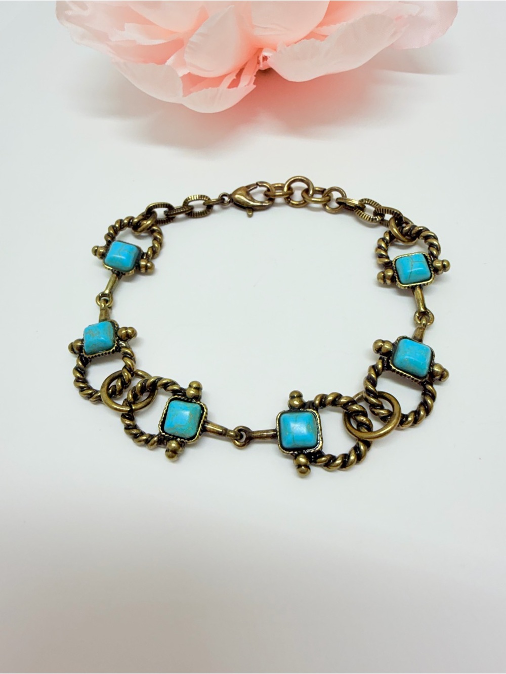 Blue turquoise horsebit bracelet with bronze chain and square turquoise stones #